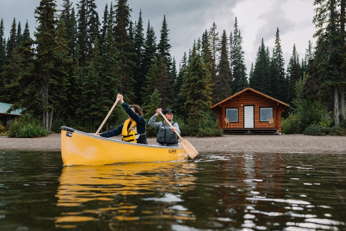 Canoe in Lake near a Cabin in British Columbia Canada